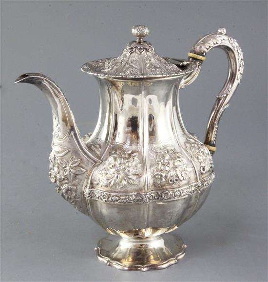 A George IV embossed silver coffee pot of melon form, Jonathan Hayne, London 1831, gross 34.5 oz.